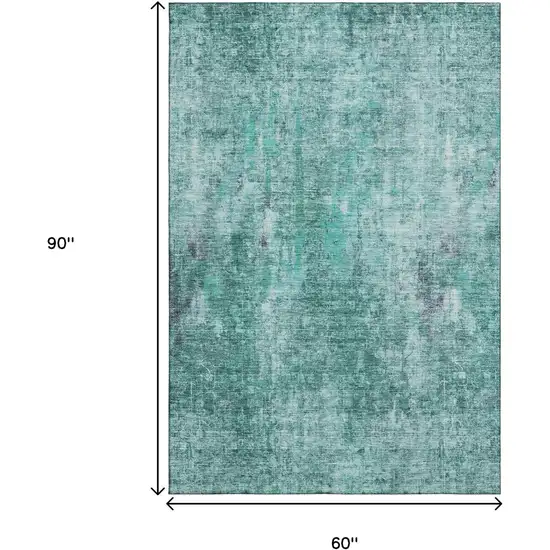 Teal And Ivory Abstract Washable Area Rug With UV Protection Photo 9