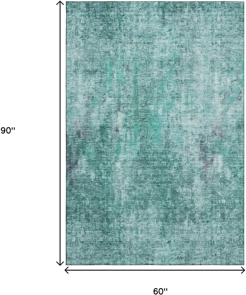 Teal And Ivory Abstract Washable Area Rug With UV Protection Photo 9