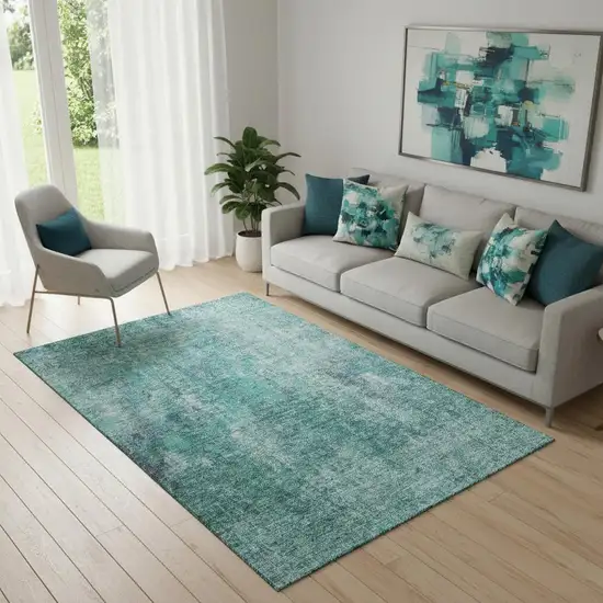 Teal And Ivory Abstract Washable Area Rug With UV Protection Photo 1