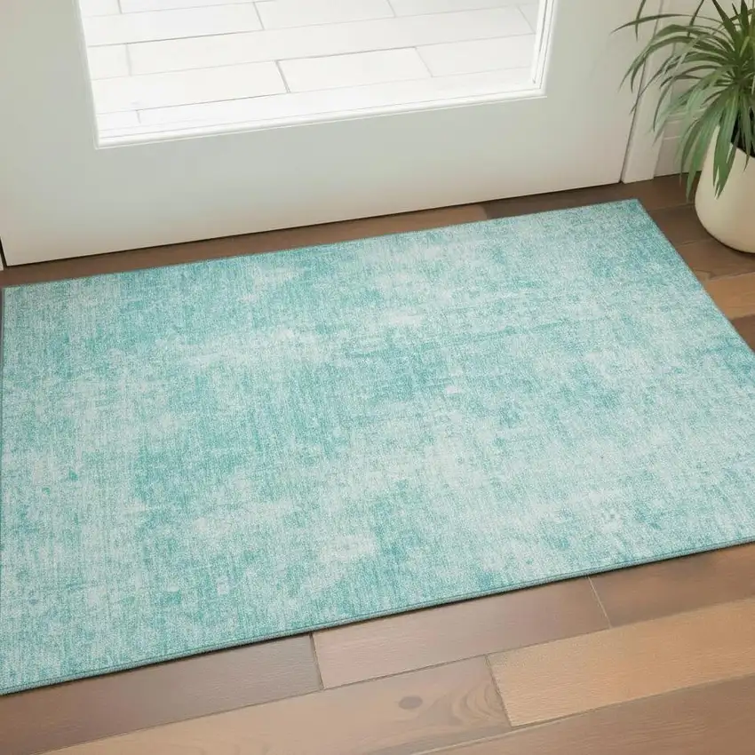 Teal And Ivory Abstract Washable Area Rug With UV Protection Photo 2
