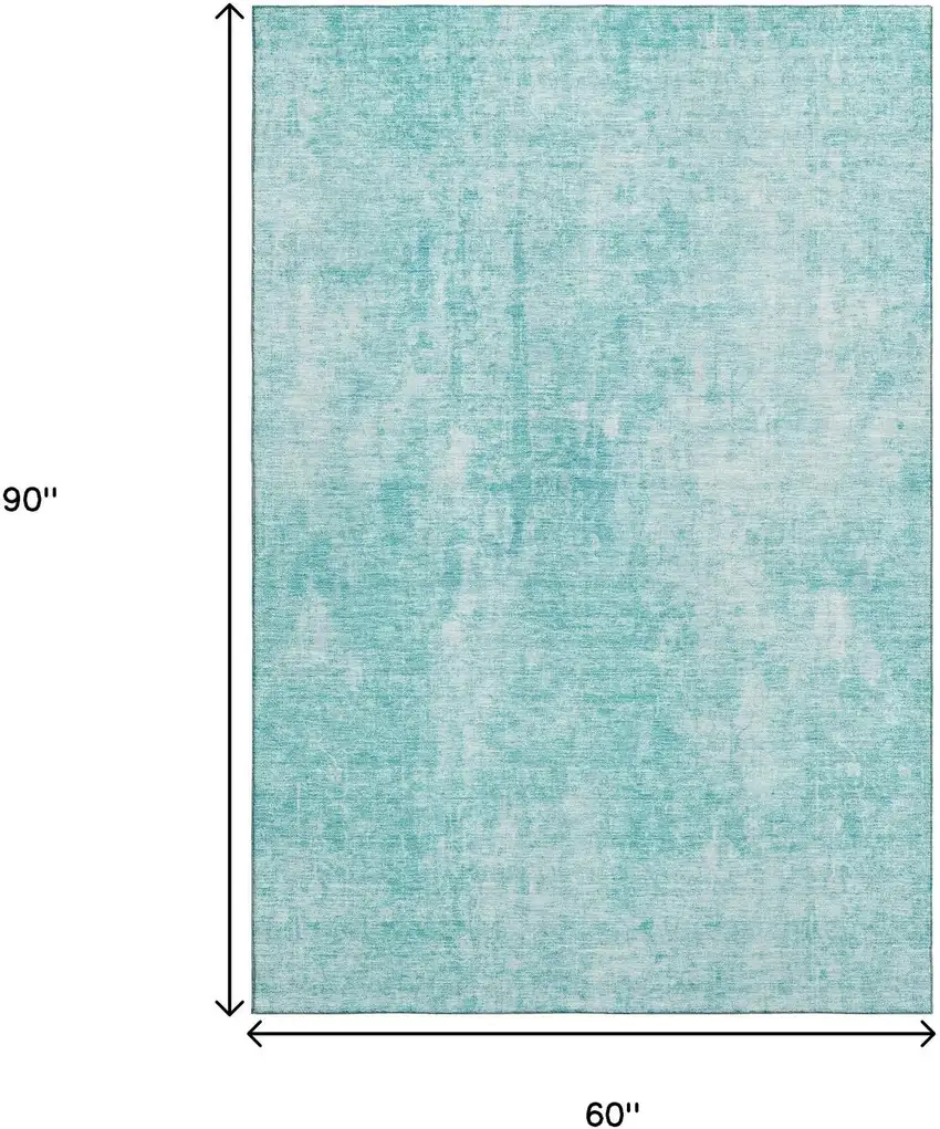 Teal And Ivory Abstract Washable Area Rug With UV Protection Photo 4