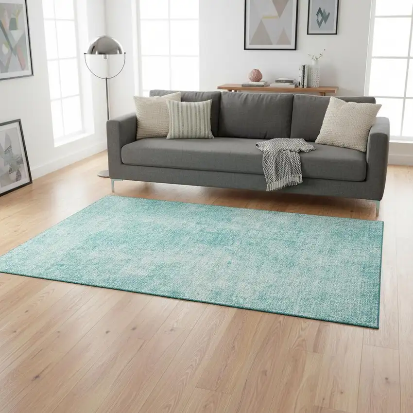 Teal And Ivory Abstract Washable Area Rug With UV Protection Photo 1