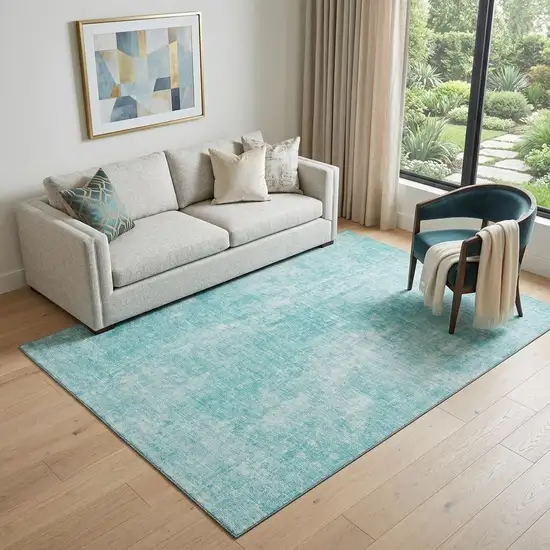 Teal And Ivory Abstract Washable Area Rug With UV Protection Photo 1