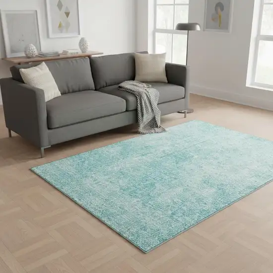 Teal And Ivory Abstract Washable Area Rug With UV Protection Photo 3