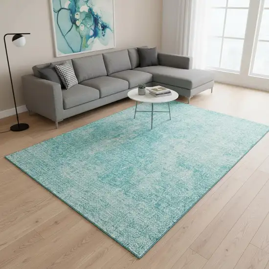 Teal And Ivory Abstract Washable Area Rug With UV Protection Photo 1
