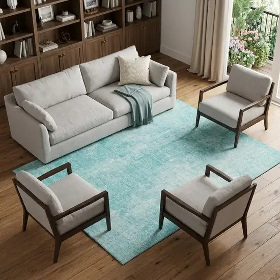 Teal And Ivory Abstract Washable Area Rug With UV Protection Photo 1