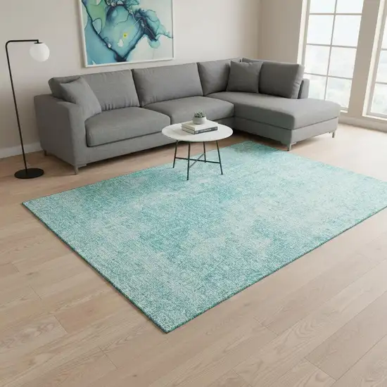 Teal And Ivory Abstract Washable Area Rug With UV Protection Photo 3