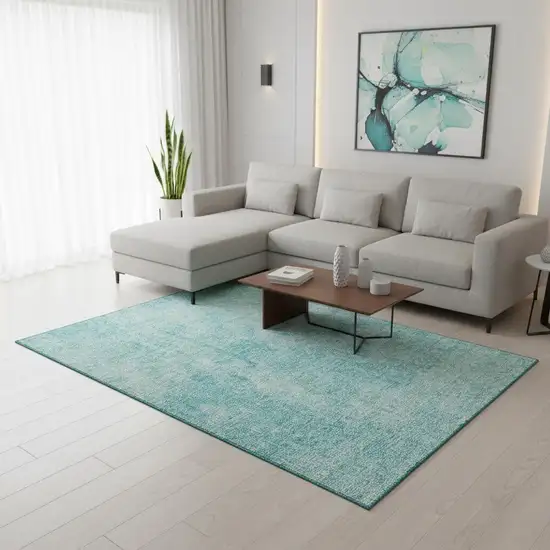 Teal And Ivory Abstract Washable Area Rug With UV Protection Photo 1