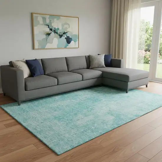 Teal And Ivory Abstract Washable Area Rug With UV Protection Photo 1