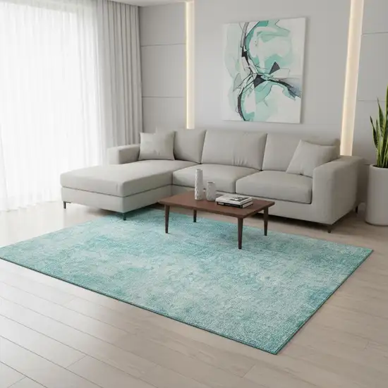 Teal And Ivory Abstract Washable Area Rug With UV Protection Photo 5