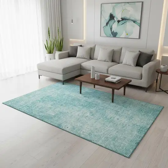 Teal And Ivory Abstract Washable Area Rug With UV Protection Photo 3