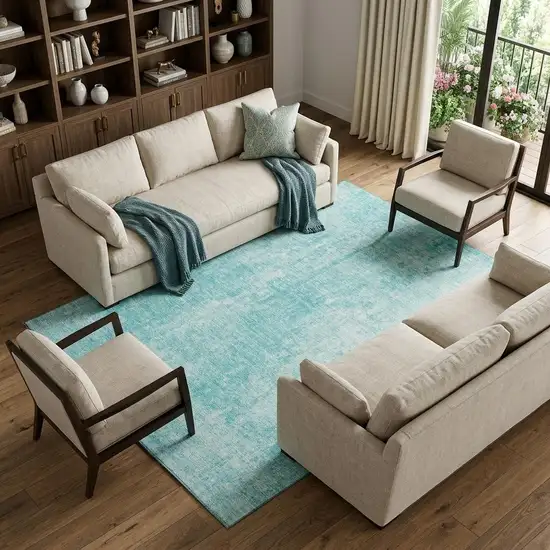 Teal And Ivory Abstract Washable Area Rug With UV Protection Photo 1