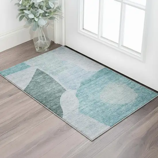 Teal And Ivory Abstract Washable Area Rug With UV Protection Photo 2