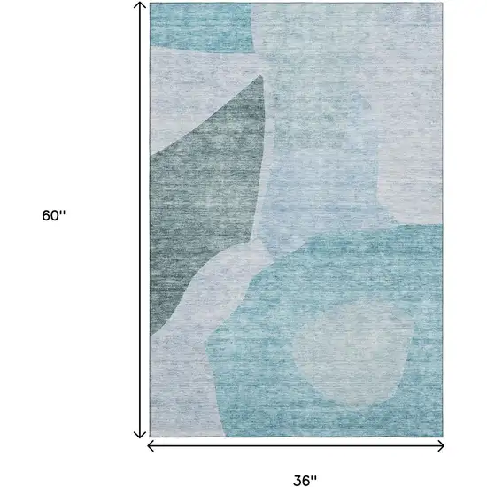 Teal And Ivory Abstract Washable Area Rug With UV Protection Photo 7