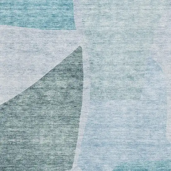 Teal And Ivory Abstract Washable Area Rug With UV Protection Photo 3