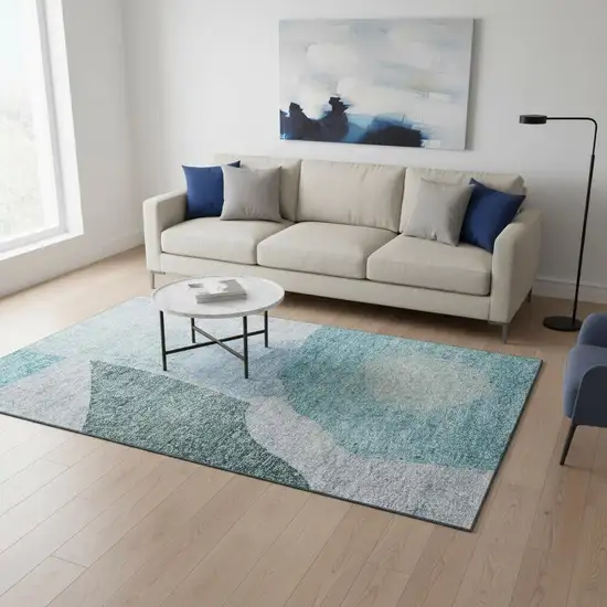 Teal And Ivory Abstract Washable Area Rug With UV Protection Photo 1