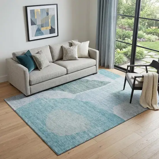 Teal And Ivory Abstract Washable Area Rug With UV Protection Photo 1