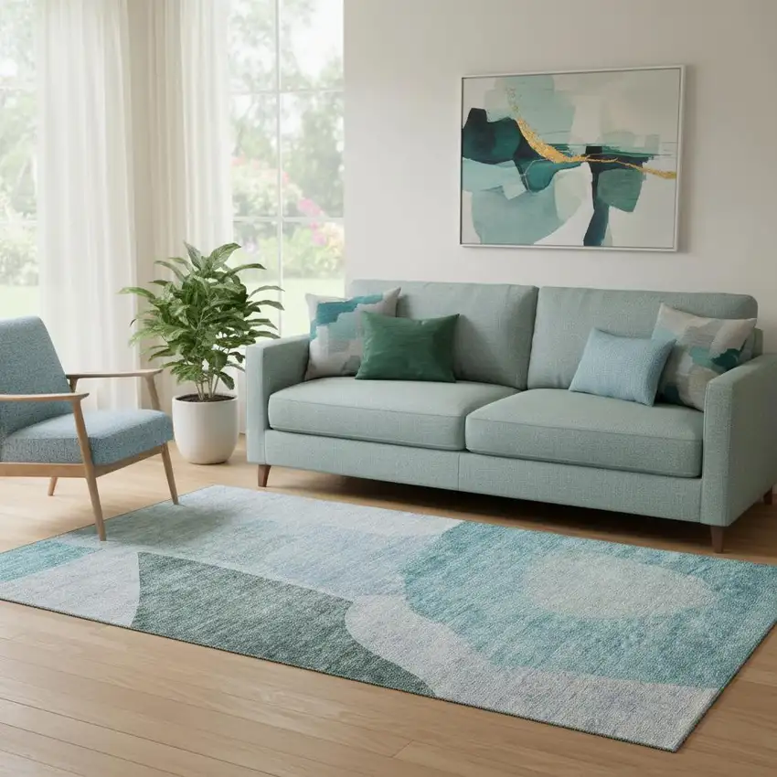 Teal And Ivory Abstract Washable Area Rug With UV Protection Photo 1