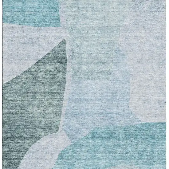 Teal And Ivory Abstract Washable Area Rug With UV Protection Photo 4