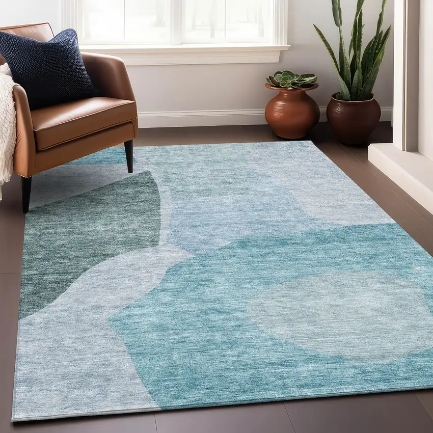 Teal And Ivory Abstract Washable Area Rug With UV Protection Photo 6