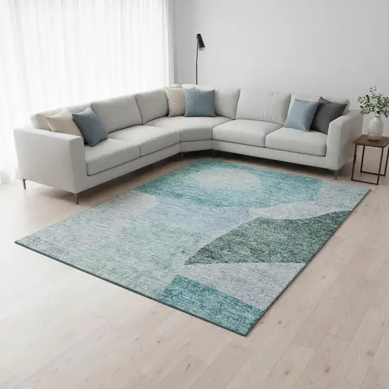 Teal And Ivory Abstract Washable Area Rug With UV Protection Photo 1
