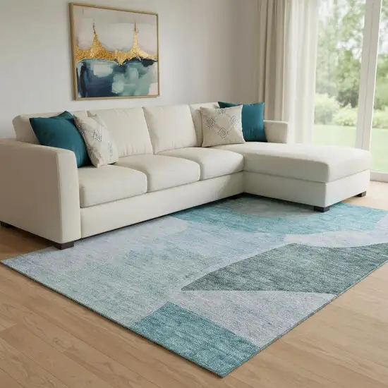 Teal And Ivory Abstract Washable Area Rug With UV Protection Photo 1