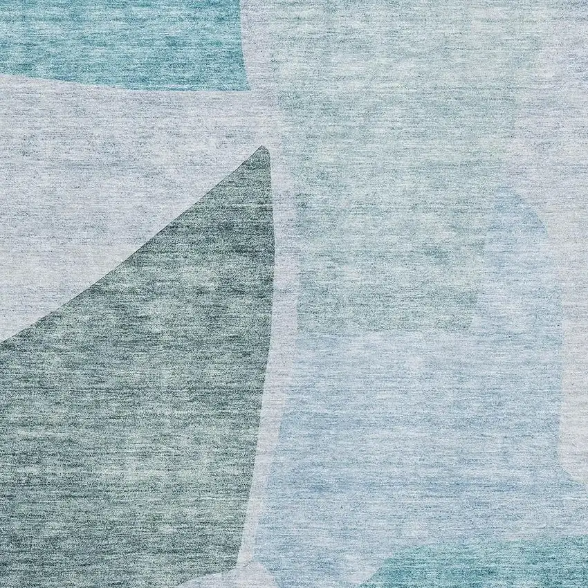 Teal And Ivory Abstract Washable Area Rug With UV Protection Photo 6