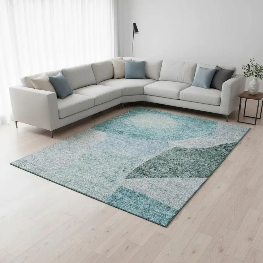 Teal And Ivory Abstract Washable Area Rug With UV Protection Photo 1