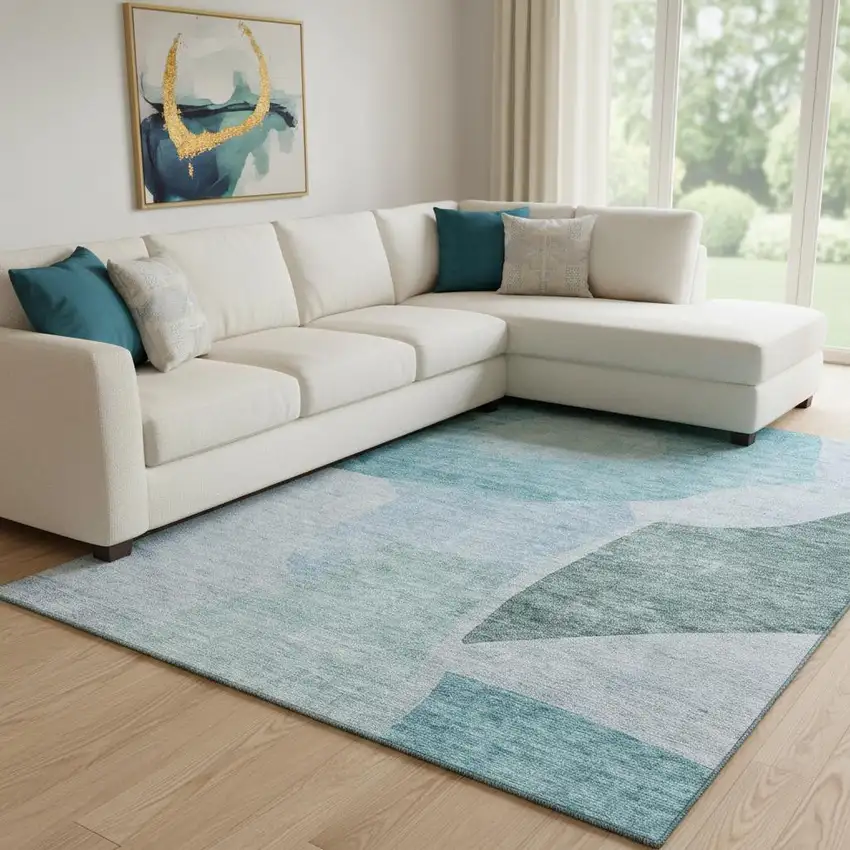 Teal And Ivory Abstract Washable Area Rug With UV Protection Photo 1