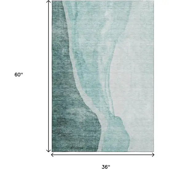 Teal And Ivory Abstract Washable Area Rug With UV Protection Photo 6