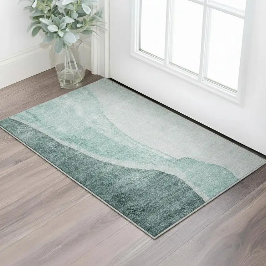 Teal And Ivory Abstract Washable Area Rug With UV Protection Photo 2