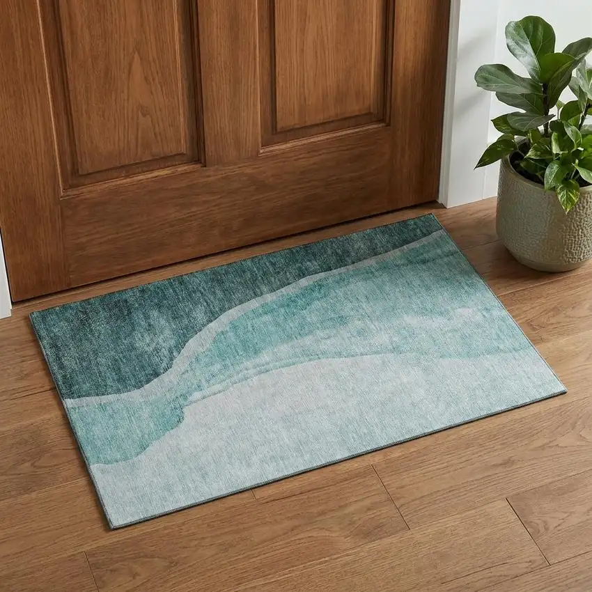 Teal And Ivory Abstract Washable Area Rug With UV Protection Photo 1