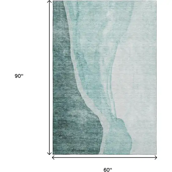 Teal And Ivory Abstract Washable Area Rug With UV Protection Photo 3