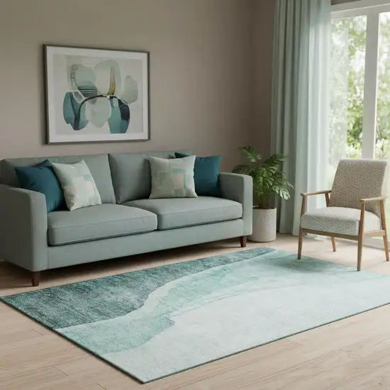 Teal And Ivory Abstract Washable Area Rug With UV Protection Photo 1