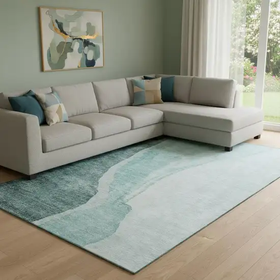 Teal And Ivory Abstract Washable Area Rug With UV Protection Photo 1