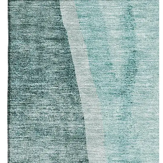 Teal And Ivory Abstract Washable Area Rug With UV Protection Photo 6