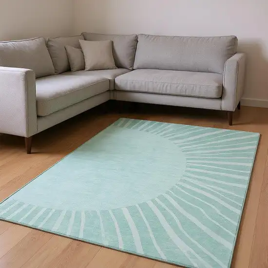 Teal And Ivory Abstract Washable Area Rug With UV Protection Photo 1