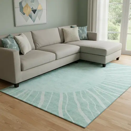 Teal And Ivory Abstract Washable Area Rug With UV Protection Photo 1