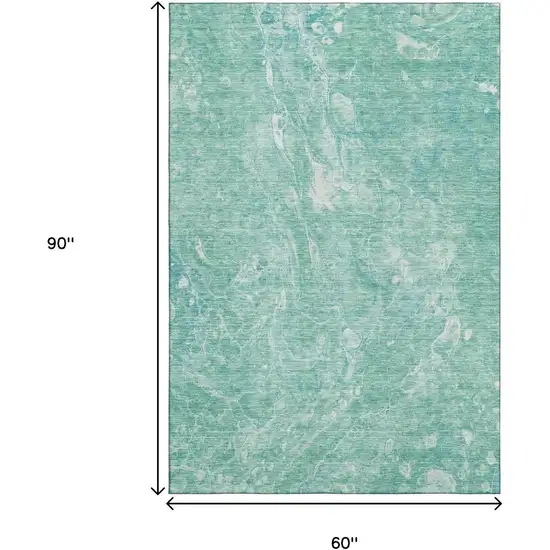 Teal And Ivory Abstract Washable Area Rug With UV Protection Photo 3