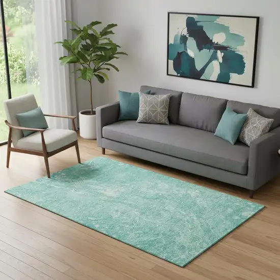 Teal And Ivory Abstract Washable Area Rug With UV Protection Photo 1