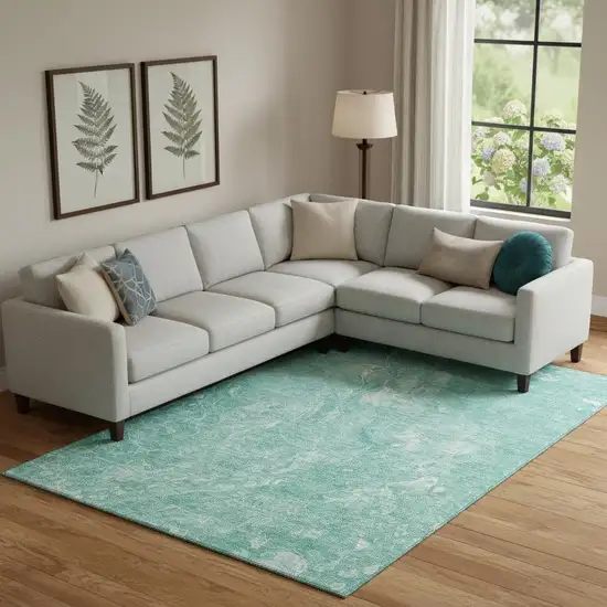 Teal And Ivory Abstract Washable Area Rug With UV Protection Photo 1