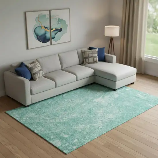 Teal And Ivory Abstract Washable Area Rug With UV Protection Photo 1