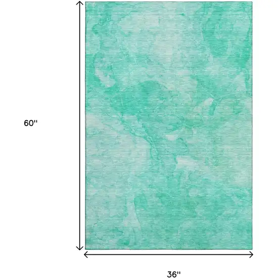 Teal And Ivory Abstract Washable Area Rug With UV Protection Photo 6
