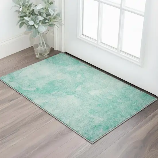 Teal And Ivory Abstract Washable Area Rug With UV Protection Photo 2