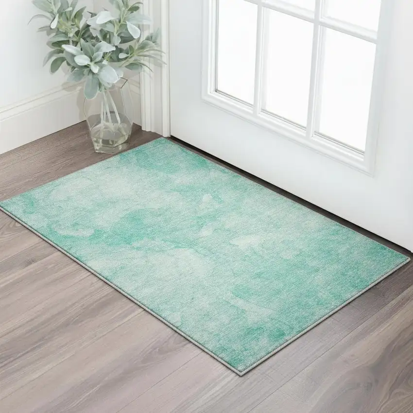 Teal And Ivory Abstract Washable Area Rug With UV Protection Photo 2