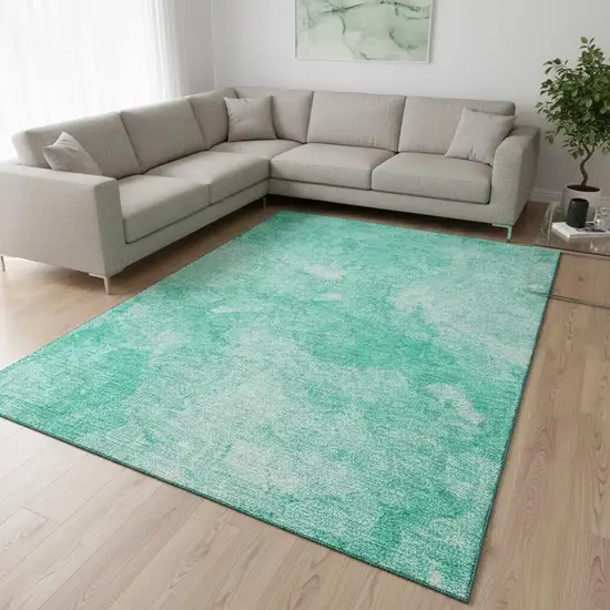 Teal And Ivory Abstract Washable Area Rug With UV Protection Photo 1