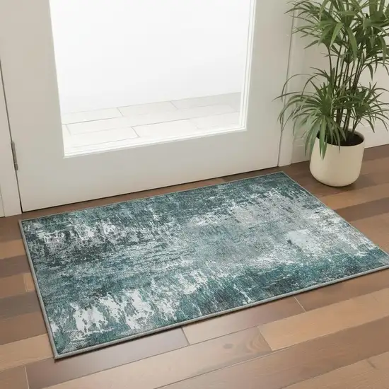 Teal And Ivory Abstract Washable Area Rug With UV Protection Photo 2