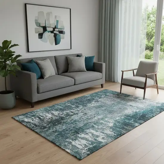 Teal And Ivory Abstract Washable Area Rug With UV Protection Photo 1