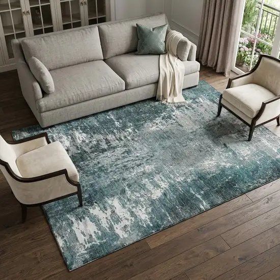 Teal And Ivory Abstract Washable Area Rug With UV Protection Photo 1