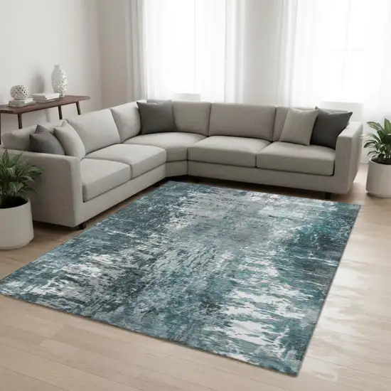 Teal And Ivory Abstract Washable Area Rug With UV Protection Photo 1